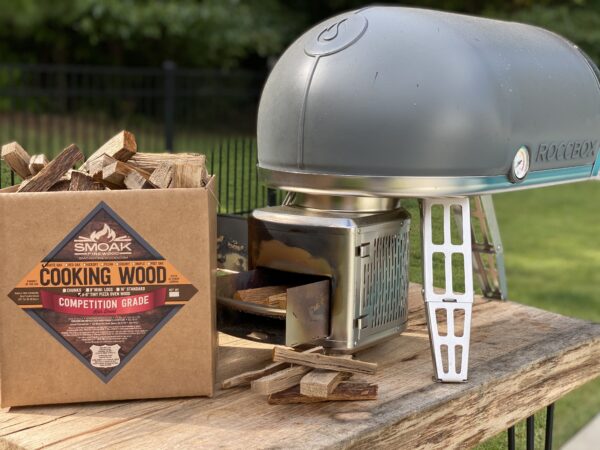 Tiny Pizza Oven Wood on a barbecue