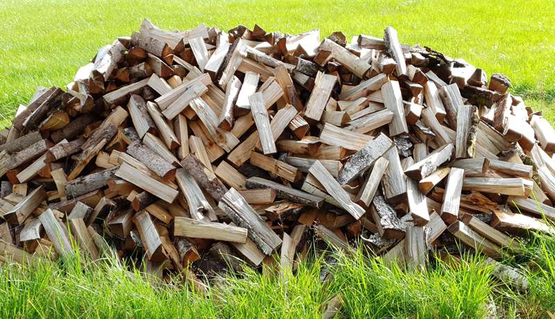 a pile of wood blocks on the ground